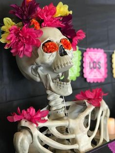 a skeleton with flowers in its hair