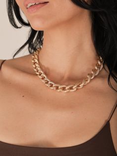 Add a bold finish to any outfit with our Mindy Chunky Chain Necklace. This statement accessory will elevate any look! Details Lobster Clasp Closure Chunky Gold Chain Heavyweight 17.5 Inches Long Unclasped Lead & Nickel Compliant Quilted Outerwear, Chunky Chain Necklace, Classic Closet, Chunky Gold Chain, Chunky Chain Necklaces, Gold Satin, Dress Jewelry, Accessories Shop, Gold Chain