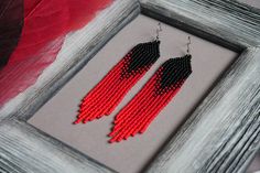 These red fringe earrings are made of high-quality Czech beads and strong synthetic thread. They are elegant, fashionable, and highly versatile, suitable for everyday wear. Features: Sterling silver components Color: red, black. S size (2.5 inches) M size (3.8 inches) This item is currently in stock. You must be completely satisfied. If you find merchandise unsatisfactory for any reason, return it within 10 days and your money will be refunded without questions. These earrings in green color https://www.etsy.com/listing/564959067/beaded-earrings-long-earrings-native?ref=shop_home_active_49 These earrings in blue colour https://www.etsy.com/listing/595281129/blue-beaded-earrings-seed-bead-earrings?ref=shop_home_active_1 These earrings in purple colour https://www.etsy.com/listing/588893791/ Elegant Red Metal Beaded Earrings, Elegant Red Beaded Fringe Earrings, Red Beaded Fringe Drop Earrings, Black And Red Beaded Earrings, Red And Black Seed Bead Earrings, Fringe Beaded Earrings, Violet Earrings, Red Fringe, Blue Beaded Earrings