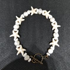 Perfect For Summer! This One Of A Kind Nautical Bracelet Has Shell And Pearl Beads. 8 Inches In Length. Bronze Colored Toggle Closure. Nautical Bracelet, Starfish Bracelet, Nail Room, Bracelet Ideas, White Cream, Pearl Bracelet, Cream White, Pearl Beads, Starfish