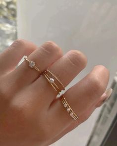 Product Description Simple stacker ring with a lot of sparkles! Made in 14k gold fill and is tarnish-resistant, showerproof, and safe for sensitive skin. Just keep it away from chemicals such as hand sanitizer, soap, and lotion for a longer life span. …………………………………. D E T A I L S • Available from US 5 to 10• Band measures 1mm• Keep away from chemicals such as lotion, soap, and hand sanitizer• Tarnish-resistant, waterproof, and safe for sensitive skin • 100% 14K Gold Filled • Build your ring stac Cute Rings Aesthetic Simple, Stacked Rings Aesthetic, Mum Diy, Pearl Stacking Ring, Dainty Gold Jewelry, Dainty Rings, Stacker Rings, Gold Rings Simple, Dainty Gold Rings