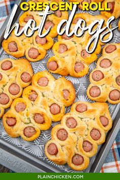 hot dogs in crescent rolls on a baking sheet with text overlay that says crescent roll hot dogs