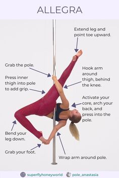 a woman is doing pole dancing exercises with her hands on the pole and pointing to the pole