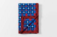 a red, blue and black checkered pocket square