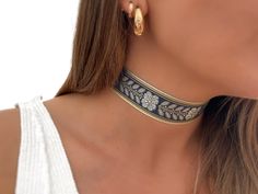 Our Choker is made of hand-sewn fabric with gold and floral details. It is adjustable, very comfortable to wear, and has a minimalist and modern style. Perfect for all types of occasions and a good gift idea. - Choker Fabric Measurement: * Length: 28 cm extendable to 6 cm * Width: 27mm - Material: * 18 kt gold plated closure - All our jewelry can get wet YOU CAN ALSO ASK FOR CUSTOM NECKLACE SIZE (Write us by message) All our jewelry is handmade with love, designed and created by us. We are lover Tenun Pattern, Fabric Choker, Boho Choker, Boho Patterns, Necklace Size, Choker Necklaces, Custom Necklace, Necklace Sizes, Choker