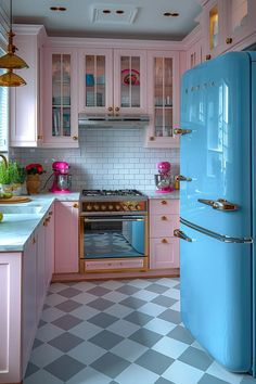 a blue refrigerator freezer sitting inside of a kitchen