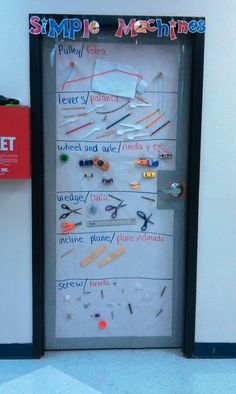 a bulletin board with tools on it in front of a door that says simple machines