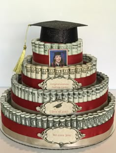 a graduation cake made to look like stacks of money