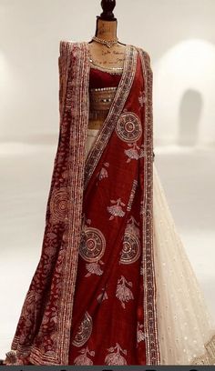 a red and white sari on display