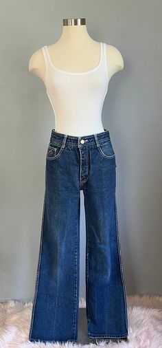 These beauties are 1980's vintage straight leg dark wash with white stitching Jordache jeans. There in GREAT condition. The denim is sturdy and the cut is flattering.  The measurement are taken laying flat: 28" waist  30" inseam  16" leg opening  17" across the hip  11" rise in front  12" rise in back Thanks for looking and please convo me any questions. Dark Wash Cropped Jeans With Contrast Stitching, Dark Wash Cropped Denim Jeans With Contrast Stitching, Cropped Leg Dark Wash Flare Jeans With Contrast Stitching, Dark Wash Cropped Leg Flare Jeans With Contrast Stitching, Dark Wash Flare Jeans With Contrast Stitching, Cropped Leg, Mid-rise Dark Wash Flare Jeans With Contrast Stitching, Dark Wash Mid-rise Flare Jeans With Contrast Stitching, Denim Cropped Straight Leg Jeans With Contrast Stitching, Mid-rise Flare Jeans With Contrast Stitching In Dark Wash