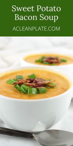 two white bowls filled with soup on top of a table