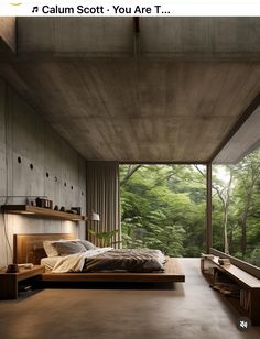 a bedroom with a large bed sitting next to a window