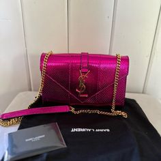 Incredible Rare, 100% Authentic Saint Laurent Ysl Reptile Ayers Python Embossed Leather Handbag. Never Used & The Only One On The Internet (As Far As I’ve Seen). I Do Have The Matching Heels That I Will Be Posting Soon. Shoes Are Not Included And Are A Separate Purchase. I Purchased This Bag New And Have Yet To Be Able To Use. It’s Truly One Of A Kind & Oh So Special! Sad To Let It Go, But I’m Making Room For Others And Hoping That Someone Will Be Able To Show Off It’s Magnificence! There Are Ze Ysl Bags Handbags, Posting Soon, Fuschia Color, Ysl Saint Laurent, Yves Saint Laurent Bags, Heart Bag, Let It Go, Crossbody Clutch, Making Room