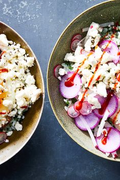 two bowls filled with different types of food