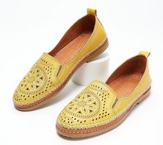 These leather slip-ons boast an intricately designed, perforated upper that demands attention. Whether you choose to wear them with your go-to jeans, a cute maxi dress, or shorts during those warm summer months, they're destined to radiate your sense of style for all to enjoy. From Spring Step. Spring Flat Heel Slip-ons With Perforations, Leather Slip-ons With Woven Sole For Spring, Spring Slip-ons With Perforations And Flat Heel, Spring Perforated Flat Heel Slip-ons, Yellow Slip-ons For Spring, Summer Leather Slip-ons With Perforations, Leather Slip-ons With Perforations For Summer, Summer Slip-ons With Perforated Toe Box And Flat Heel, Yellow Slip-ons For Summer