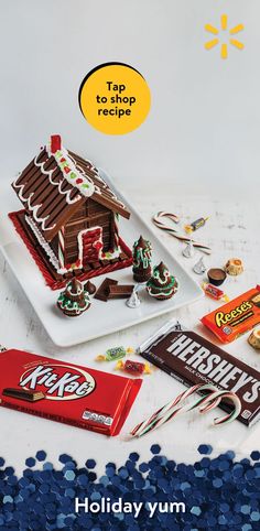 an advertisement for hershey's holiday yum chocolate house with candy and candies