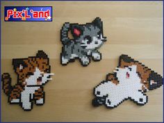 four pieces of perler bead art depicting cats and kittens on a wooden surface