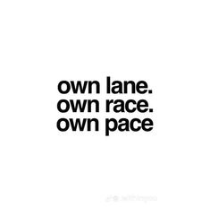 a black and white photo with the words own lane, own race, own pace