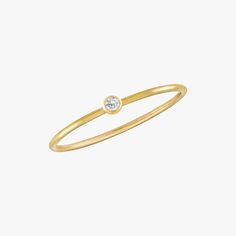 Minimal baby bezel CZ ring, perfect to sparkle and shine all day and all night. Material 14 Karat Gold Filled. Cubic Zirconia. Nickel free. Suitable for sensitive skin. Quantity & Measurement For 1 ring only US size: 5, 6, 7, 8 and 9 *Rings for layering purposes only. Sold separately. Minimal Baby, Hammered Band, Bezel Ring, Silver Stacking Rings, Twist Ring, Gold Ring Stack, Gold Band Ring, Cz Ring, Ring Gold