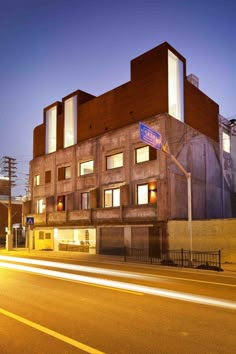 an old building is lit up at night