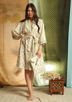 This vibrant yellow robe was hand printed using carved wood blocks by a family of traditional Indian Artisans in Jaipur, India. The soft cotton is so comfy you will feel like a queen. These robes have two deep side pockets and a detachable tie belt. Great for lazy Sundays around the house, a day at the pool, a beach vacation, Netflix and a glass of wine, or even for your bridesmaids on your wedding day. Comes with a matching block printed bag for travel or storage. PRODUCT DETAILS: •100% cotton Traditional Cotton Home Robe, Traditional Cotton Robe For Home, Traditional Yellow Cotton Kimono, Bag For Travel, Printed Robe, Jaipur Rajasthan, Jaipur India, Traditional Indian, Printed Bags