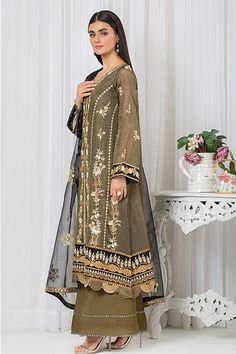 Pakistani Traditional Clothes - IMROZIA PREMIUM Embrace cultural elegance with our IMROZIA PREMIUM Traditional Dress Pakistani. This exquisite outfit features an embroidered Zari Net stitched with lining, highlighted by button details. The dyed raw silk culottes are accented with sequins lace, and the embroidered organza dupatta adds a touch of sophistication. Main Features: Embroidered Zari Net with lining Button details Dyed raw silk culottes with sequins lace Embroidered organza dupatta Note: Dress Pakistani, Embroidered Organza, Organza Dupatta, Fabric Stores Online, Traditional Clothes, Kurta Set, Traditional Dress, Designer Suits, Raw Silk