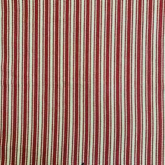 a red and white striped fabric with small black dots on the bottom right half of it