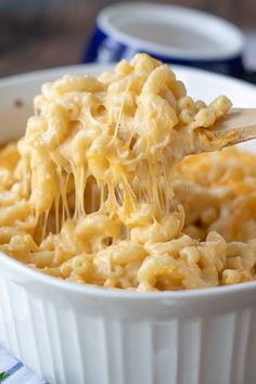 a white bowl filled with macaroni and cheese