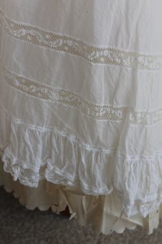 Victorian white cotton, silk and lace long frilled wedding underskirt, Boho Hippie or Prairie bridal skirt, white cotton summer skirt. Beautiful quality thick cotton underskirt with a V shaped front waist band and a pull cord gathered back opening. There is an embroidered  monogram to the front right waist band and darts to create a shaped front to this lovely underskirt. About half way down the skirt is a cream silk ribbon threaded through an eyelet insert running around the skirt. Below this a White Summer Skirt, White Skirt Summer, Bridal Skirt, Bridal Skirts, Silk And Lace, Alternative Bride, Black Costume, Bride Inspiration, Embroidered Monogram