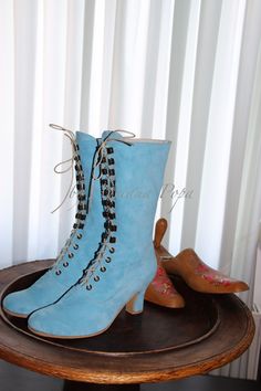 "This is an individual boot execution. You can ORDER individual boots . Customised size for wider , strong calf and narrow feet also. Beautiful Victorian High Heel Boots . All materials very qualitative. Baby Blue suede leather / Blue Suede leather Are issued by limited series. Model inspired from 1900 boot style. You can get remarkable and not expensive handmade boots. The specified sizes are European Mid calf height: height of the heel 2.6 \"inch/ 7 cm length of the boot from the bottom of the Vintage Blue Leather Boots, Blue Lace-up Boots With Reinforced Heel, Blue Leather Heeled Boots With Snip Toe, Blue Leather Knee-high Heeled Boots, Blue Almond Toe Boots With Leather Sole, Edwardian Boots, Granny Boots, Victorian Boots, Womens Booties