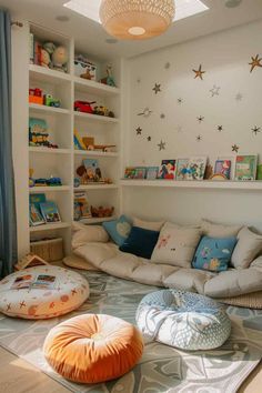 a child's room with bookshelves and toys on the floor in it