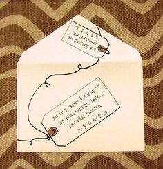 an envelope with two tags attached to it