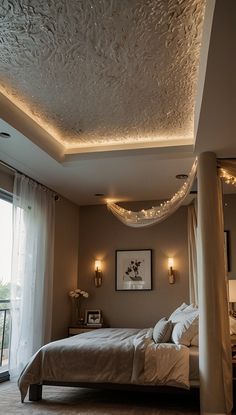 a bedroom with a canopy bed and lights on the ceiling