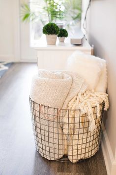 a basket that is sitting on the floor