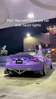 a purple car parked in front of a building with the words pov you own a purple car with heart lights