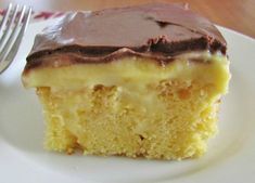 a piece of cake sitting on top of a white plate