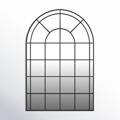 a black and white photo of an arched window with bars on the top, against a light gray background