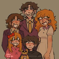 the family is posing for a photo together