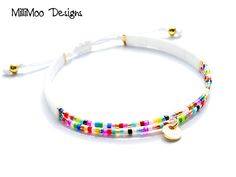 When Ordering please order your actual wrist size and I will adjust to fit! NEW "Tessa" Gorgeous Rainbow Miyuki Tila Bead Bracelet in Beautiful Rainbow Mix with 24k Gold Plated Tila Beads Rainbow Friendship Bracelet Fully Adjustable 5mm x 5mm Opaque White, miyuki tila beads 5mm x 1mm Miyuki Tila Beads 24Kt Gold Plated, 2mm Miyuki Delica Beads Rainbow Mix 6mm Gold Plated Brass Etched Disc Charm Colour Beads may vary Slightly INTERNATIONAL ORDERS IF YOU REQUIRE TRACKING PLEASE CHOOSE EXPRESS POSTA White Friendship Bracelet With Sliding Knot, White Braided Bracelet With Tiny Beads For Festivals, White Beaded Bracelets With Sliding Knot For Festival, White Sliding Knot Bracelets For Friendship, White Sliding Knot Beaded Bracelets For Festivals, White Resizable Friendship Bracelet For Festivals, White Wrap Bracelet With Round Beads For Festival, White Beaded Wrap Bracelet For Festival, White Tiny Beads Friendship Bracelet