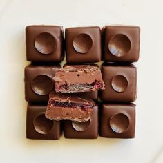 several pieces of chocolate are stacked on top of each other