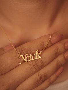 Imagine a necklace that speaks volumes about your love and devotion. Our personalized 14K gold name necklace is more than just an accessory; it's a timeless piece of jewelry that symbolizes your enduring bond. With its elegant design and customizable name, this necklace is a perfect way to express your deep affection and create a lasting memory. Features and Benefits: ✅ Personalized design with your chosen name ✅ Crafted from high-quality 14K gold for durability and shine ✅ Elegant and timeless Schmuck Gold, Name Crafts, Necklace Name, Name Pendant, Anniversary Gift For Wife, Gold Name Necklace, Anniversary Gifts For Wife, Name Jewelry, Custom Name Necklace