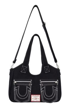 Contrast topstitching and horseshoe-stitched pockets bring signature style to a denim shoulder bag with handy zip pockets and a removable crossbody strap. 13" x 15" x 5" Magnetic snap closure Dual shoulder straps; removable, adjustable crossbody strap Exterior with two zip pockets; two slip pockets Interior with zip pocket; slip pocket Lined Textile Imported Western Purses And Handbags Denim, True Religion Bag, Horseshoe Logo, Denim Blue Shoulder Bag With Pockets For On-the-go, Black Gothic Shoulder Bag With Rivets, Gothic Shoulder Bag With Hardware, Denim Shoulder Bags, Denim Handbags, Jeans Brands