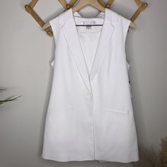 Peter Nygard White Sleeveless Blazer Vest Nwt Brand: Peter Nygard Department: Womens Color: White Size: 8 Size Type: Regular Type: Top Style: Vest Sleeve Length: Sleeveless Fit: Regular Pattern: Solid Closure: Buttons Country/Region Of Manufacture: Indonesia Condition: Nwt Sleeveless Blazer Vest, Black Fur Vest, Duster Vest, Open Front Vest, Black Leather Vest, Silk Vest, Sleeveless Blazer, Long Duster, Style Vest