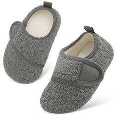 a pair of gray slippers on top of each other