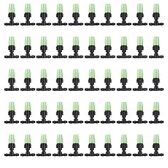 several rows of black and green candles on a white background