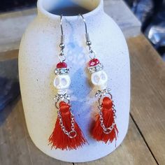 Give Your Ears A Spooky Boho Twist With These Handcrafted Skull Tassel Earrings. Perfect For Those Days When You Feel Like Raising Some Spirits. Red Nylon And Silk Blend Tassels Off White Magnesite Gemstone Carved Skull Charms Dangle Style Hook Closure Lightweight Top To Bottom = 80mm (Over 3" Long) Size: Womens 80x14mm Condition: New With Tags Voodoo Skull, Spike Ear Cuff, Carved Skull, Boho Twists, Vintage Clip Earrings, Skull Carving, Party Earrings, Crystal Stars, Pink Jewelry