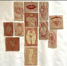 nine handmade wall hangings with different designs on them