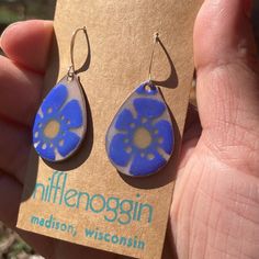 Stencilled enamel design on an enamel background.  Lead-free enamel on copper. I design and torch-fire these in my home studio.  Ear wires are nickel free. All earrings come with a set of silicone stoppers. Exact measurements & weight happily available upon request! Madison Wi, Enamel Earrings, I Design, Enamel Jewelry, Blue Flower, Home Studio, Ear Wires, My Home, Blue Flowers