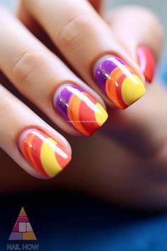 Vibrant Swirls Nail Art - Check out these cool summer nail designs featuring vibrant swirls of orange, purple, and yellow. Perfect for adding a pop of color to your summer look! Get more summer nail inspo at nailhow.com. Swirls Nail Art, Swirl Nail Art