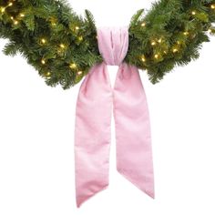 a pink scarf tied to a christmas wreath with lights on it's sides and a pink bow around the neck